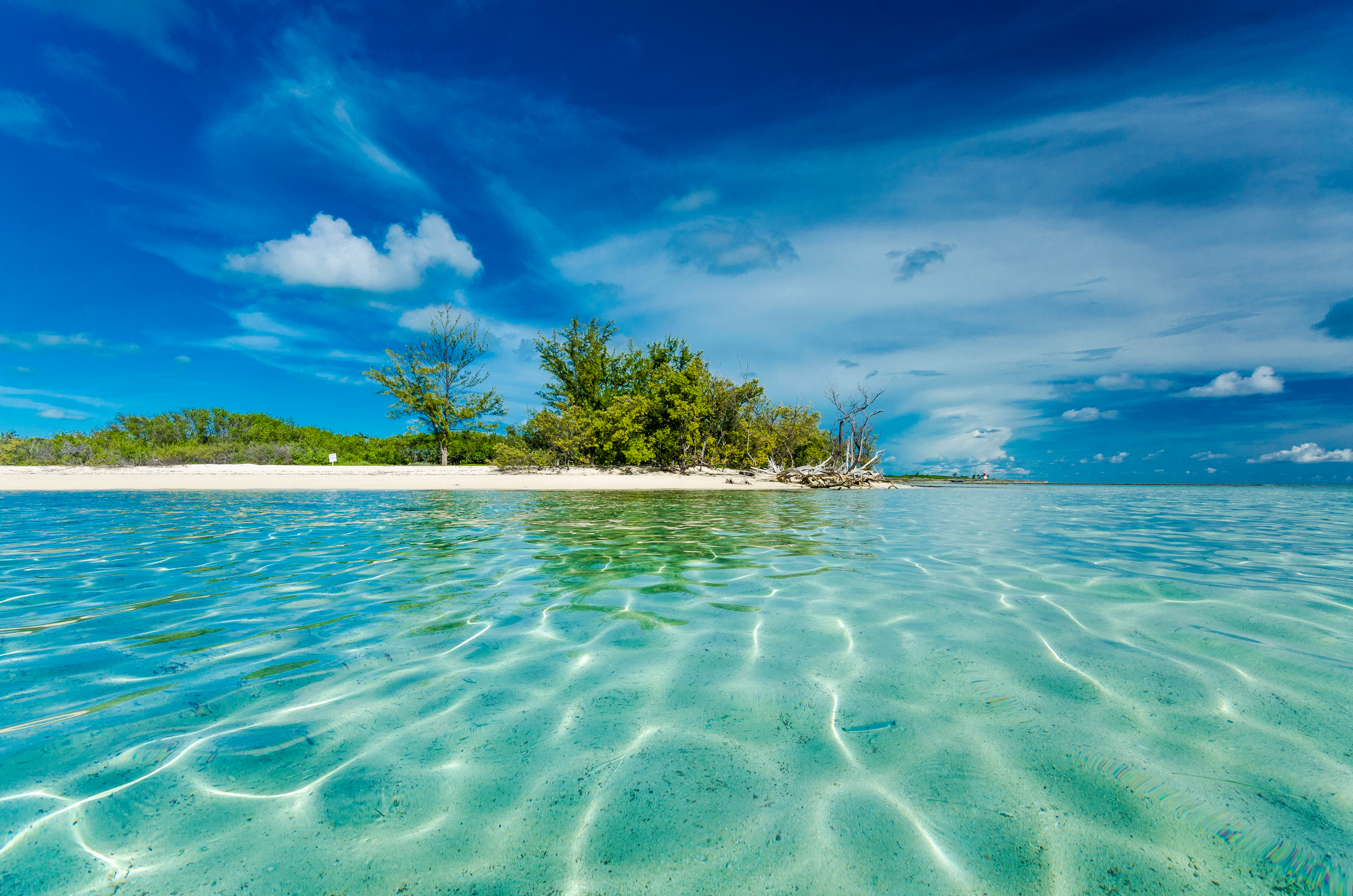 Clear waters of an islet in Bimini, a port of call on our 2022 summer needlework cruise